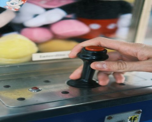 Mechanical koala using arcade controls in the fictional Koala Control Trial game